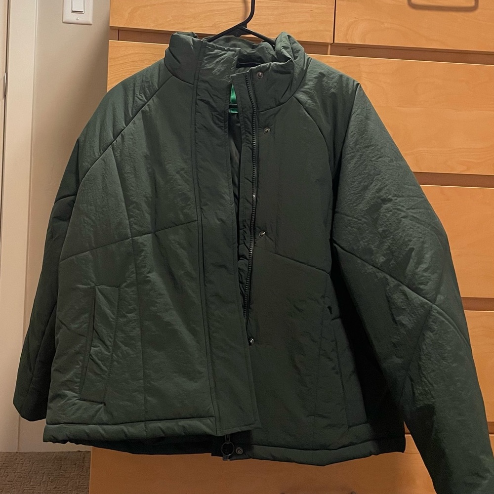 Oversized green puffer jacket